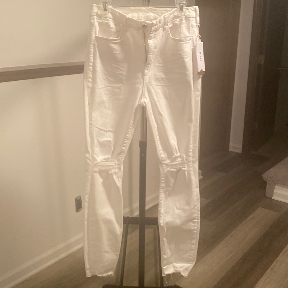 Woman’s size 32 white distress H&M skinny jeans